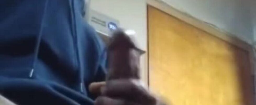 Horny black college dude rubbing his huge cock