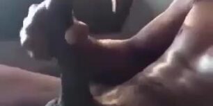 Horny black stroking my huge cock while i watch porn