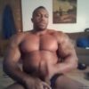 Black bodybuilder showing his sexy body and huge cock