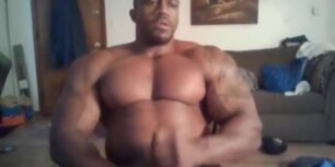 Black bodybuilder showing his sexy body and huge cock