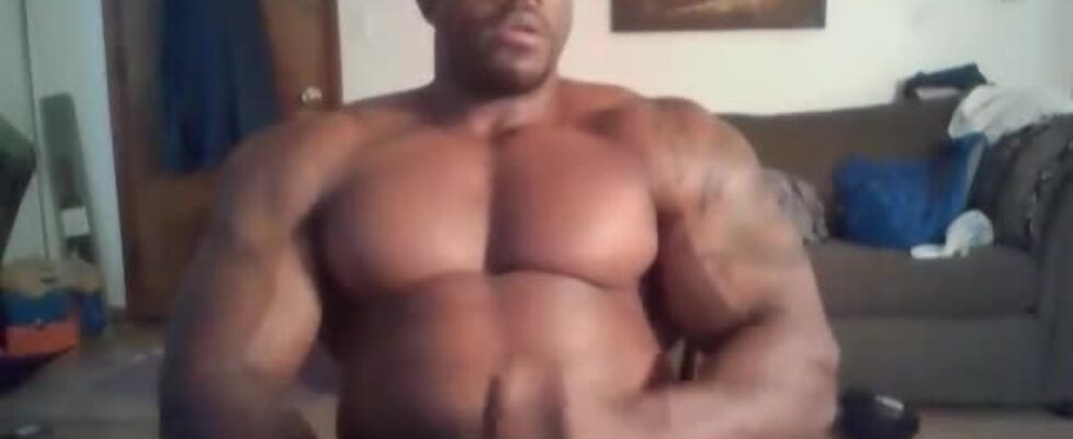 Black bodybuilder showing his sexy body and huge cock