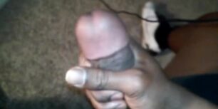 black strokes his huge uncut cock while shooting a huge load