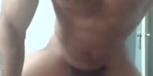 Horny tattooed black dude masturbating with his new toy