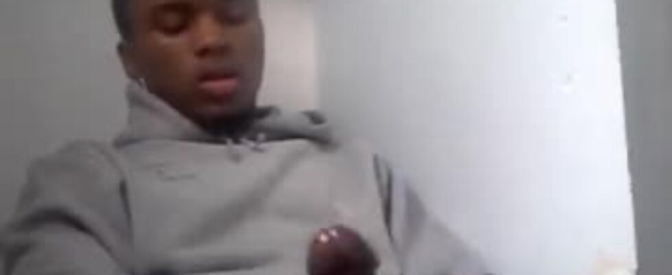 Young black stroking his cock during a work break