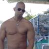 Cute black stud masturbates outdoors while working out