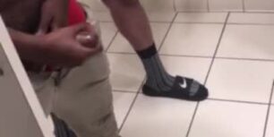 Group of horny guys stroking their cock in public toilet