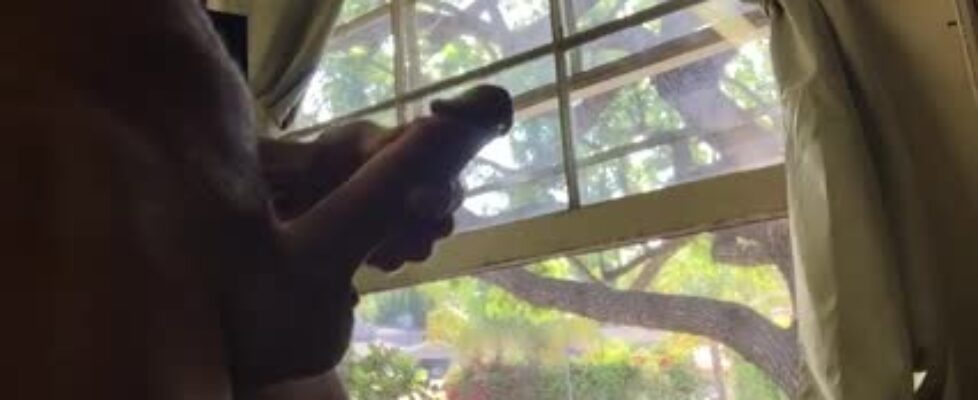 Masturbating in front of the window
