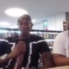 Horny college black dude rubbing his cock in a public library