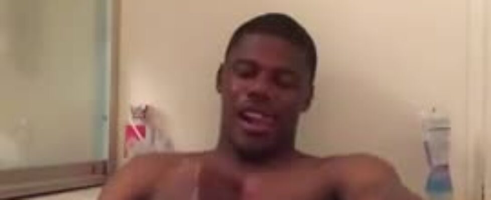 Black dude rubbing his huge long cock