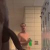 Young black with a huge horse cock masturbates in the gym lockers