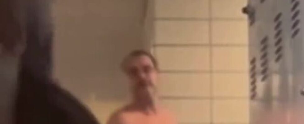 Young black with a huge horse cock masturbates in the gym lockers