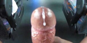 Black dude rubbing his huge cock at a public buss and shooting a huge load