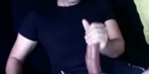 Mature guy rubbing his huge tatsy cock on his sofa