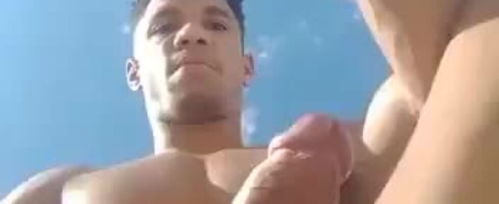 Showing off my huge cock on the beach