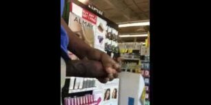 Black guy rubbing his cock in a supermarket in front of everybody