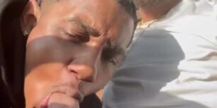 Black thug sucking his friend's huge dick in the car