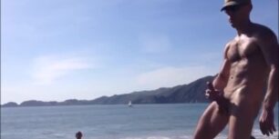 muscled daddy jerking off in a public beach
